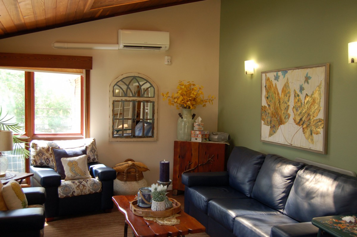 Cozy living room with tasteful decor and comfortable seating.