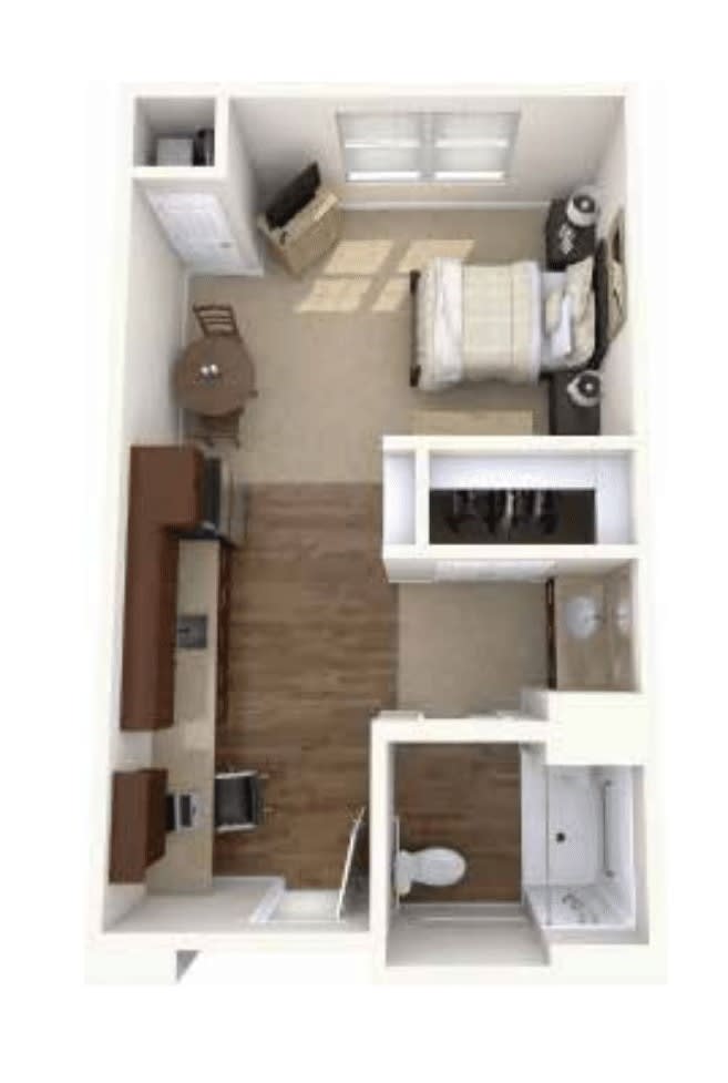 A compact apartment floor plan featuring a bedroom, small kitchen area, and bathroom.
