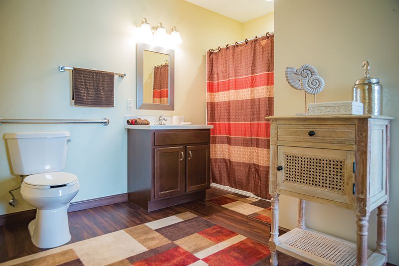 Cozy bathroom with warm tones and modern decor.