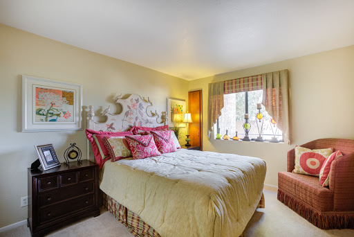 Cozy and inviting bedroom with warm colors and elegant decor.