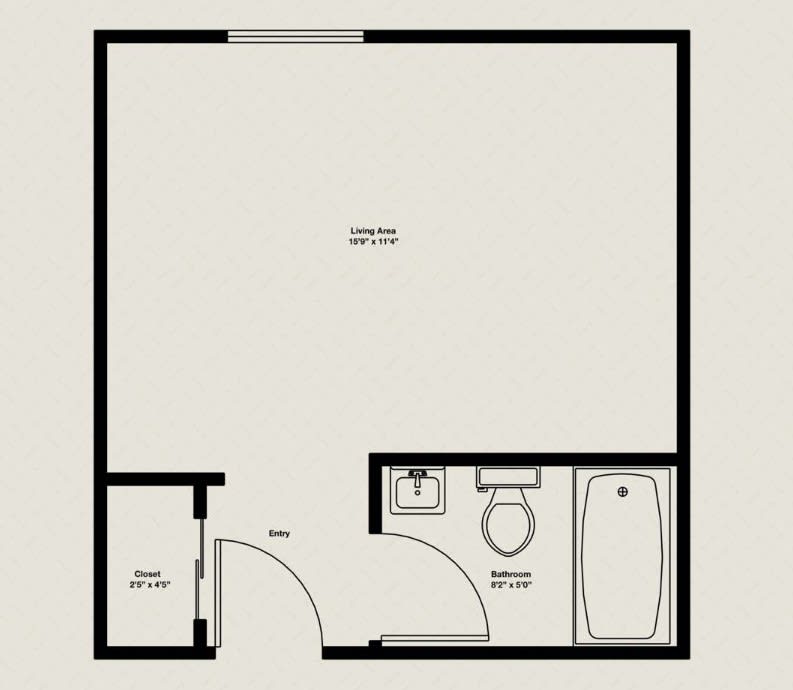 A floor plan of a studio apartment with a bathroom, featuring a toilet, sink, and bathtub.