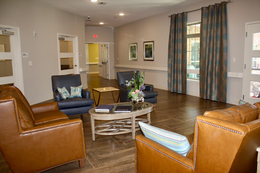 A cozy and inviting lounge area featuring comfortable seating and modern decor.
