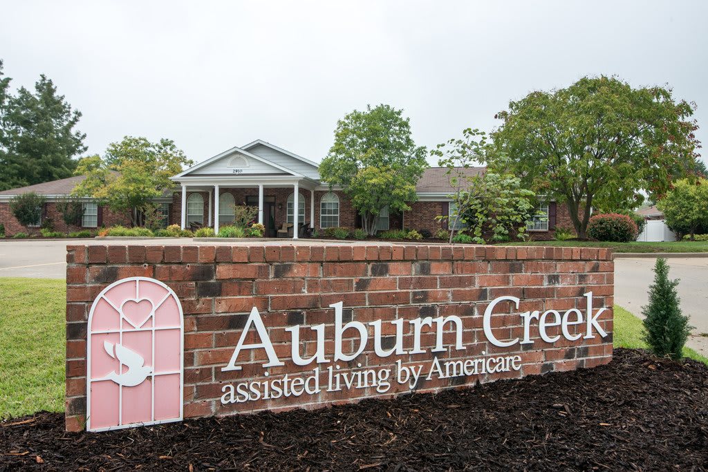 Entrance sign for Auburn Creek assisted living facility.