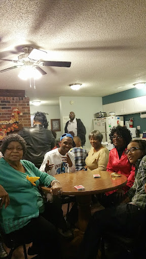 A fun evening with friends and family gathered around a table, enjoying games and good company.