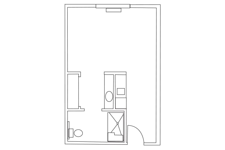 A simple floor plan depicting a small apartment layout with a bathroom.