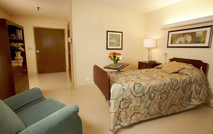 A cozy and well-lit bedroom with stylish decor.