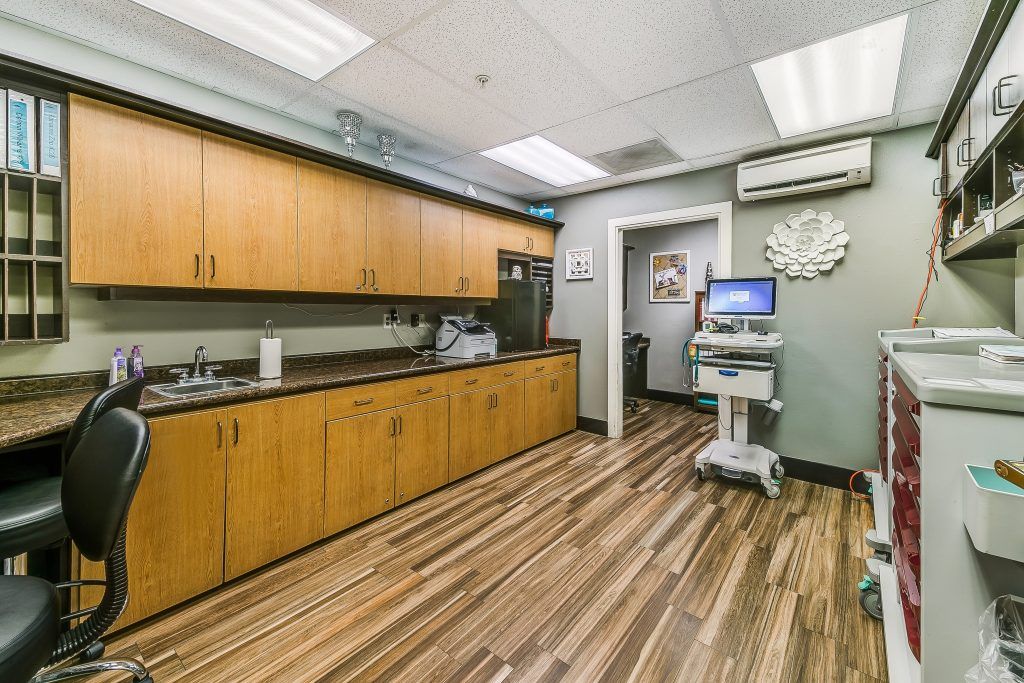 A clean and well-organized medical office with modern equipment.