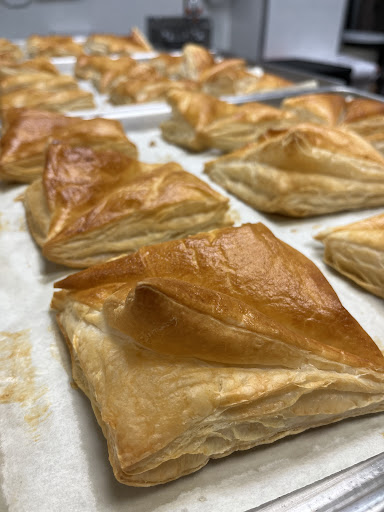 Freshly baked flaky pastries ready to be enjoyed.
