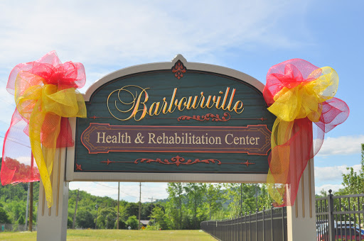Sign for the Barboursville Health & Rehabilitation Center, decorated with colorful bows.