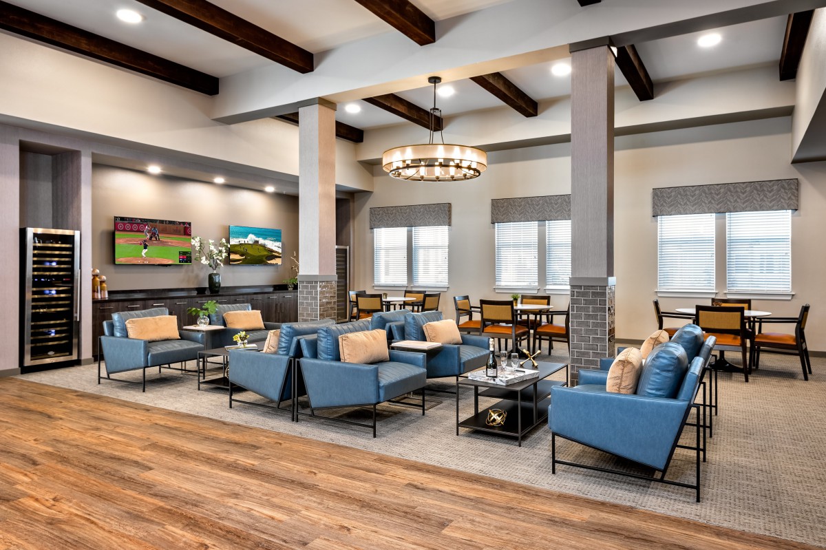 Modern lounge area with stylish seating and elegant lighting.