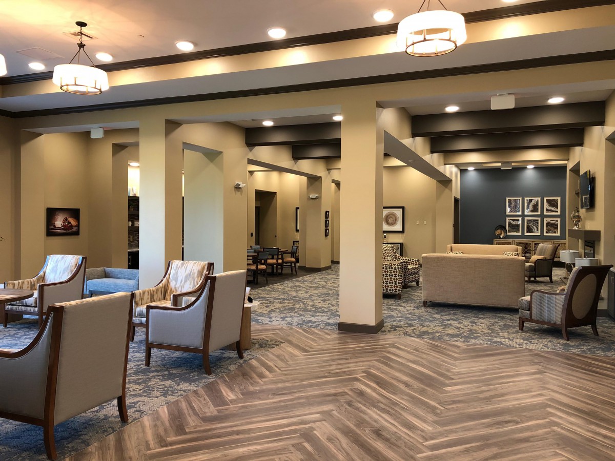 A modern lobby with comfortable seating and elegant lighting.