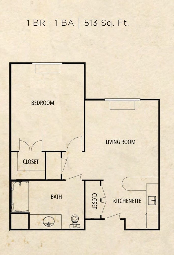A floor plan of a one-bedroom apartment featuring a living room, kitchenette, bathroom, and closet.