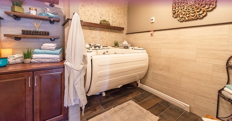 A cozy bathroom featuring a uniquely designed bathtub and elegant decor.