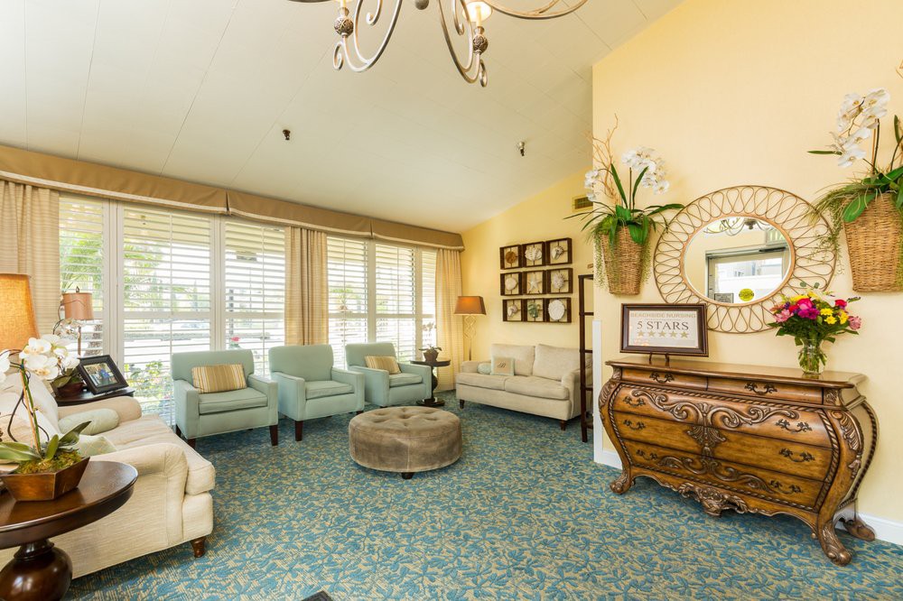 A cozy living room with comfortable seating and elegant decor.