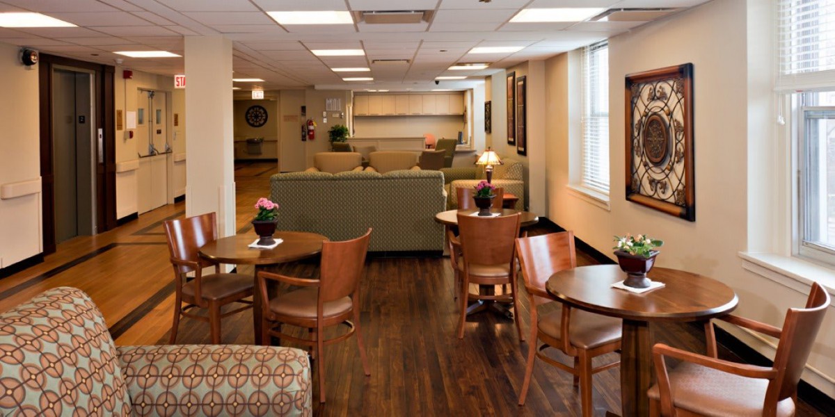 A cozy lounge area with tables, chairs, and sofas.