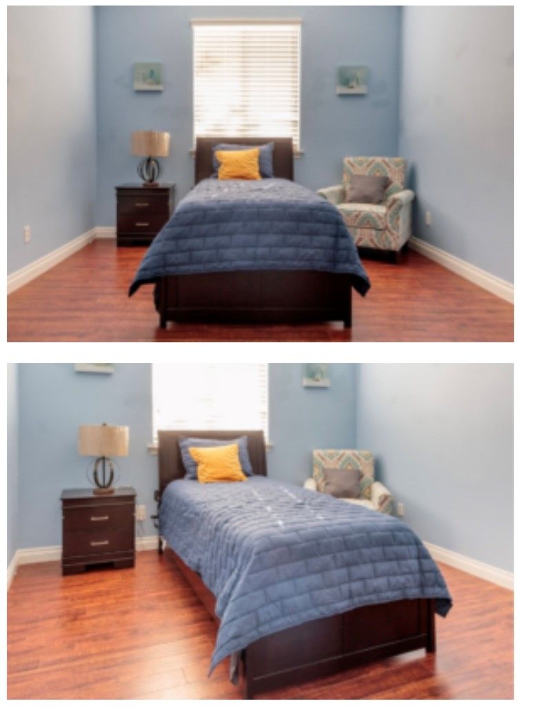 A cozy, neatly arranged bedroom with a single bed, nightstand, chair, and lamp.