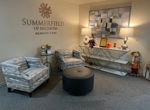 A cozy and modern lobby area featuring stylish seating and decorative elements.