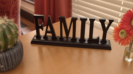 A decorative piece symbolizing the importance of family.