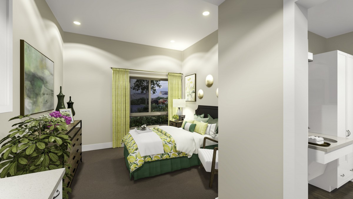 A modern and elegantly designed bedroom with green accents.