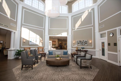 A stylish and inviting lobby area with modern furniture and plenty of natural light.