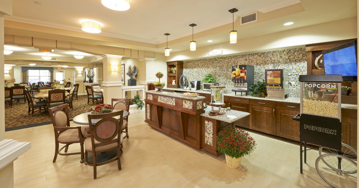 A modern kitchen with an island counter and elegant interior design.