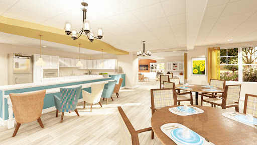 A contemporary kitchen and dining area featuring modern furnishings and an open layout.