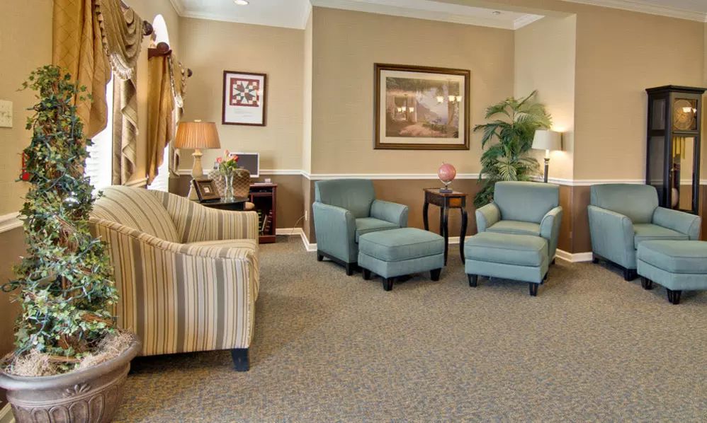 A cozy living room with comfortable seating and elegant decor.