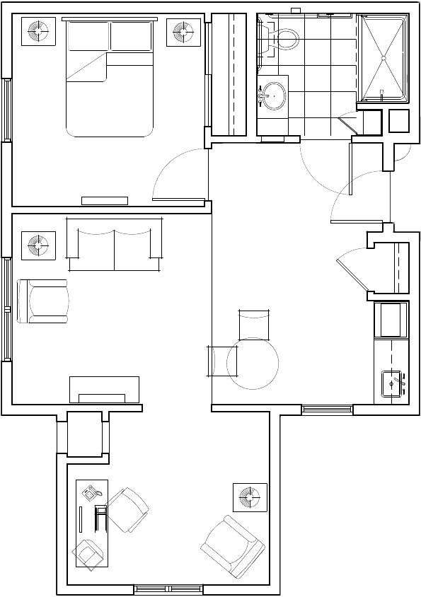 A floor plan layout of a residential apartment, featuring a bedroom, living area, kitchen, and bathroom.