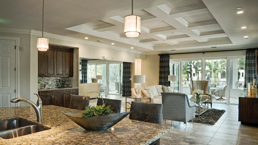 A beautifully designed open-concept living space with modern furnishings and abundant natural light.
