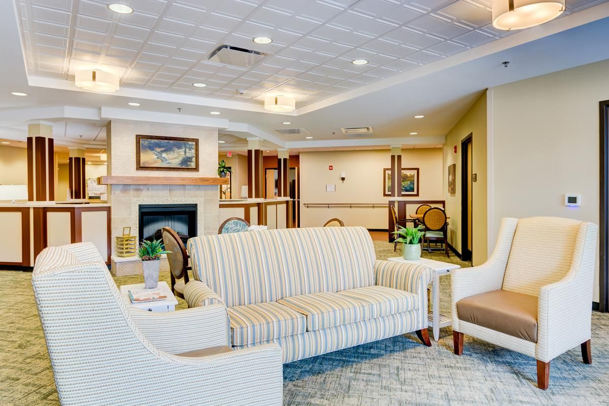 A comfortable and elegantly designed lobby area with sofas and decorative elements.