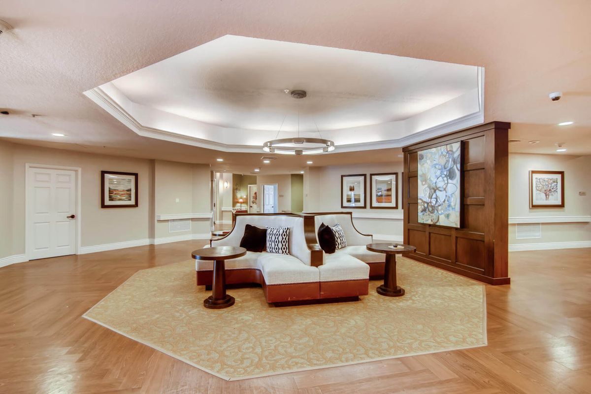 A modern lobby with elegant seating and artistic decorations.