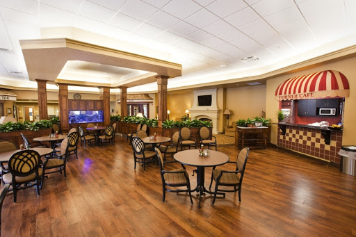 A cozy lounge area featuring comfortable seating and a warm ambiance.