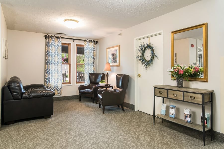 A cozy living room with elegant furniture and stylish decor.