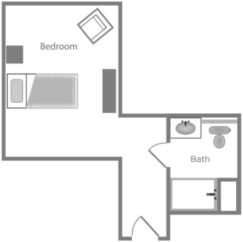 A simple floor plan showing a bedroom and bathroom layout.