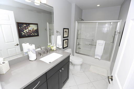 A contemporary bathroom featuring sleek design elements and a clean aesthetic.
