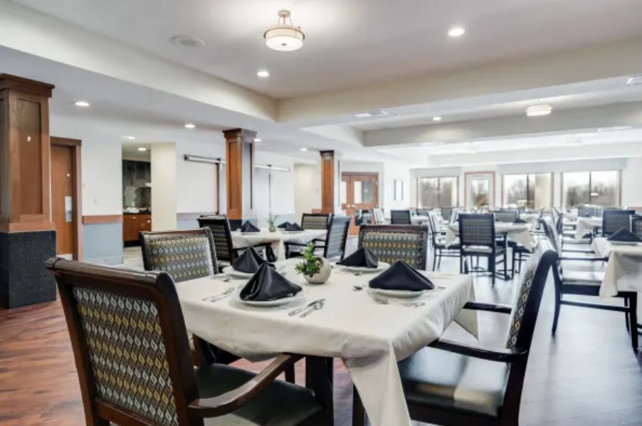 An elegantly set dining room, ready for guests.
