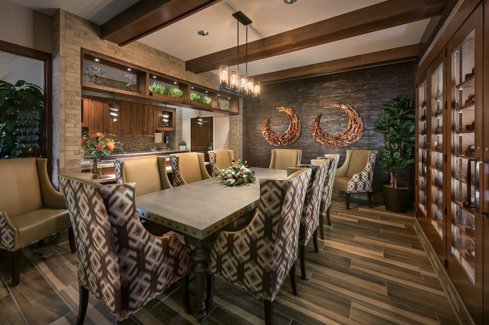 Elegant dining room with wood accents and stylish decor.