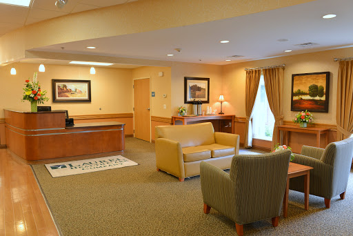 A welcoming lobby featuring comfortable seating and a reception desk.