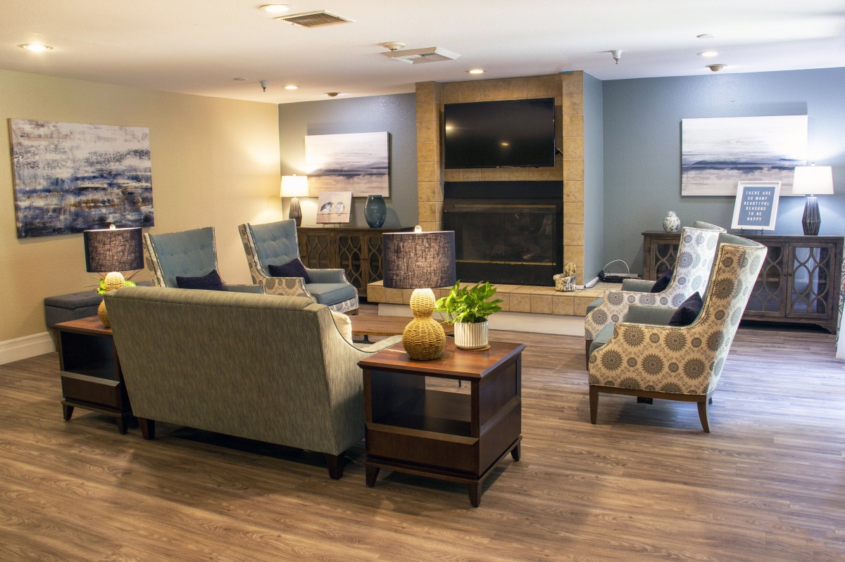 A cozy living room with comfortable seating and warm decor.