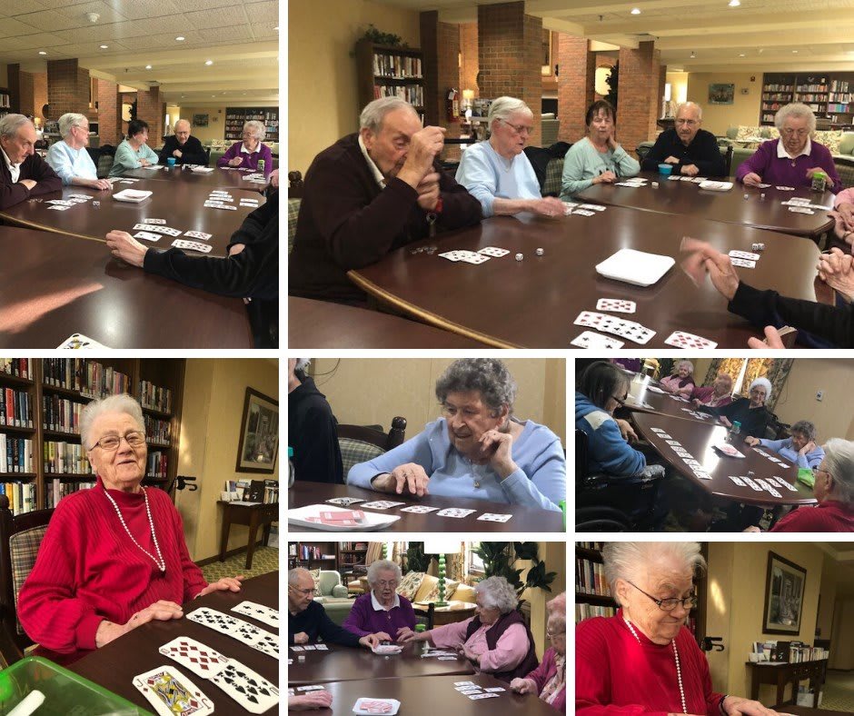 A group of seniors enjoying a card game together.