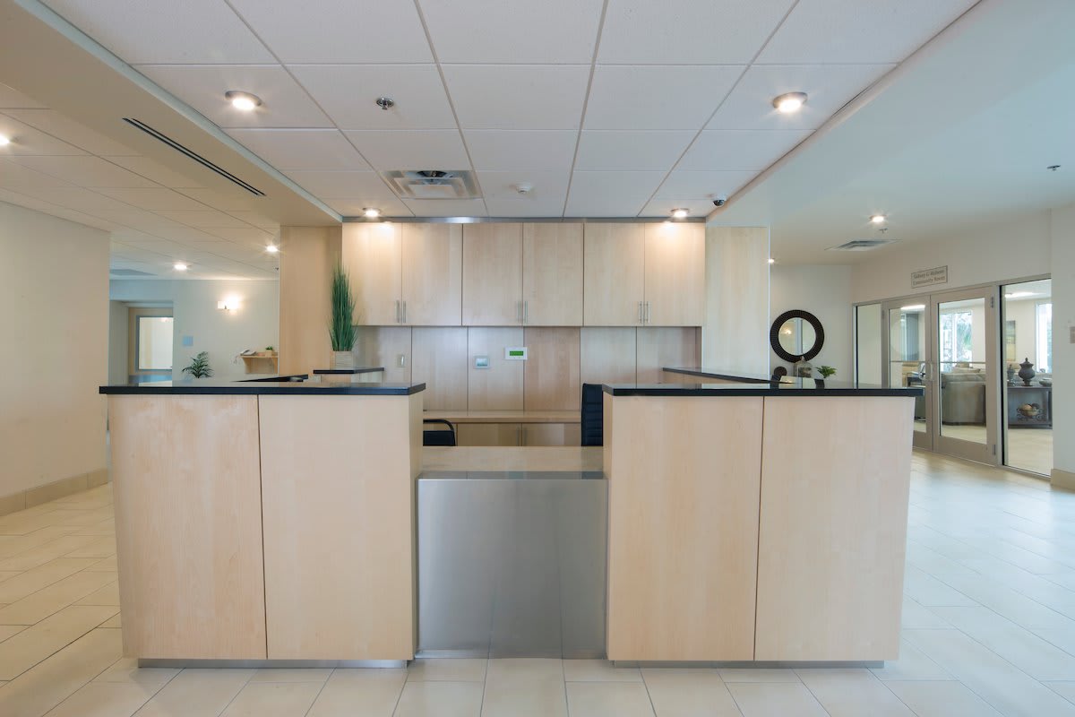 A modern office reception area with a minimalist design.
