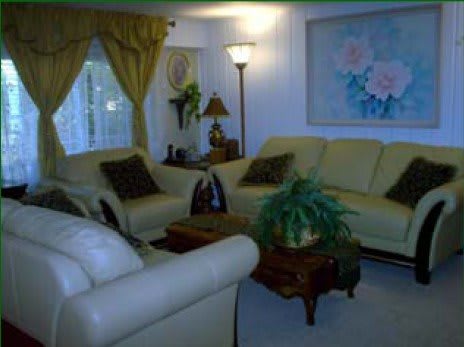 A cozy living room with comfortable sofas and elegant decor.