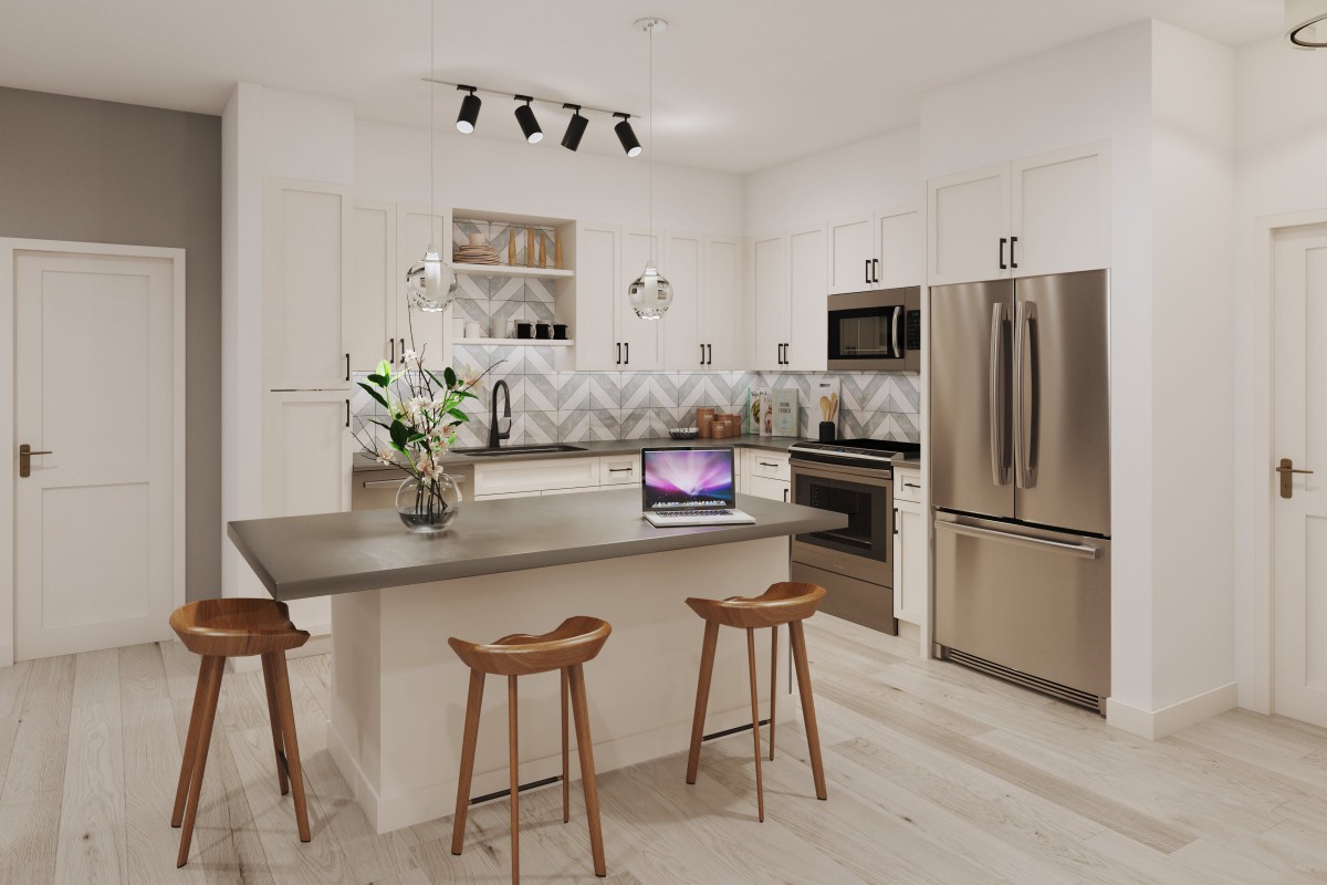 A modern kitchen with a large island, stainless steel appliances, and stylish bar stools.