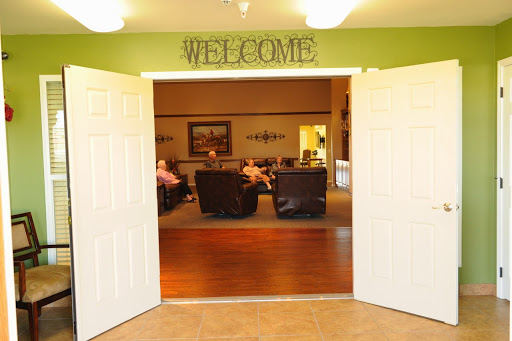 A welcoming entrance to a cozy living area with comfortable seating.