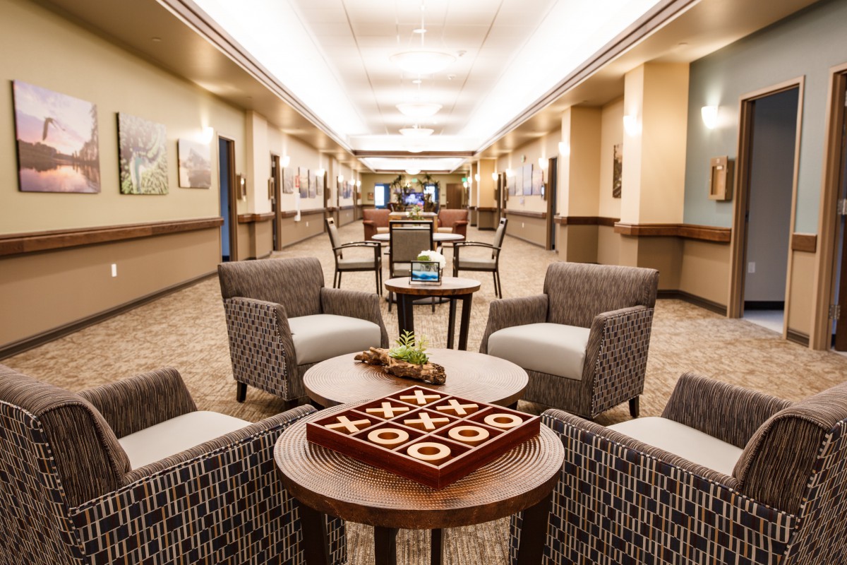 A spacious hotel lobby with comfortable seating arrangements and elegant interior design.