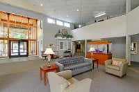 A spacious lobby with comfortable seating and a welcoming atmosphere.