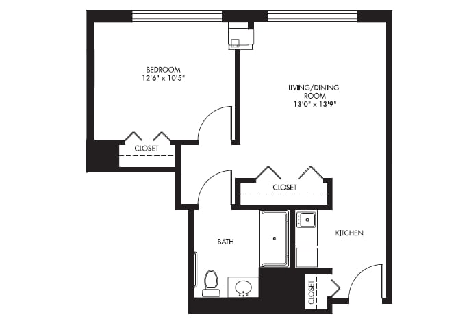 One-bedroom apartment floor plan with designated living room, kitchen, and bathroom areas.