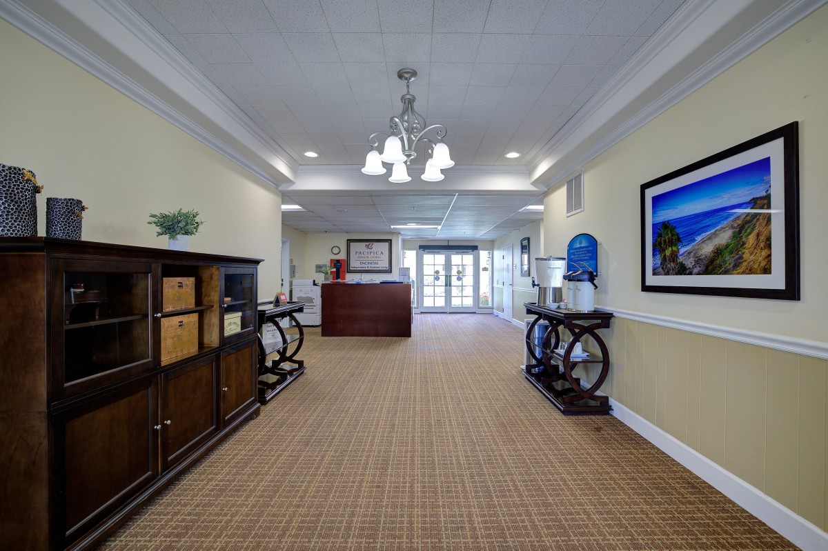 A well-lit lobby or reception area featuring elegant furniture and decor.