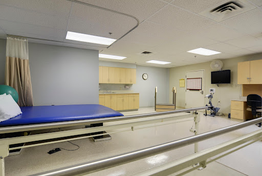 A clean and modern rehabilitation room in a hospital.