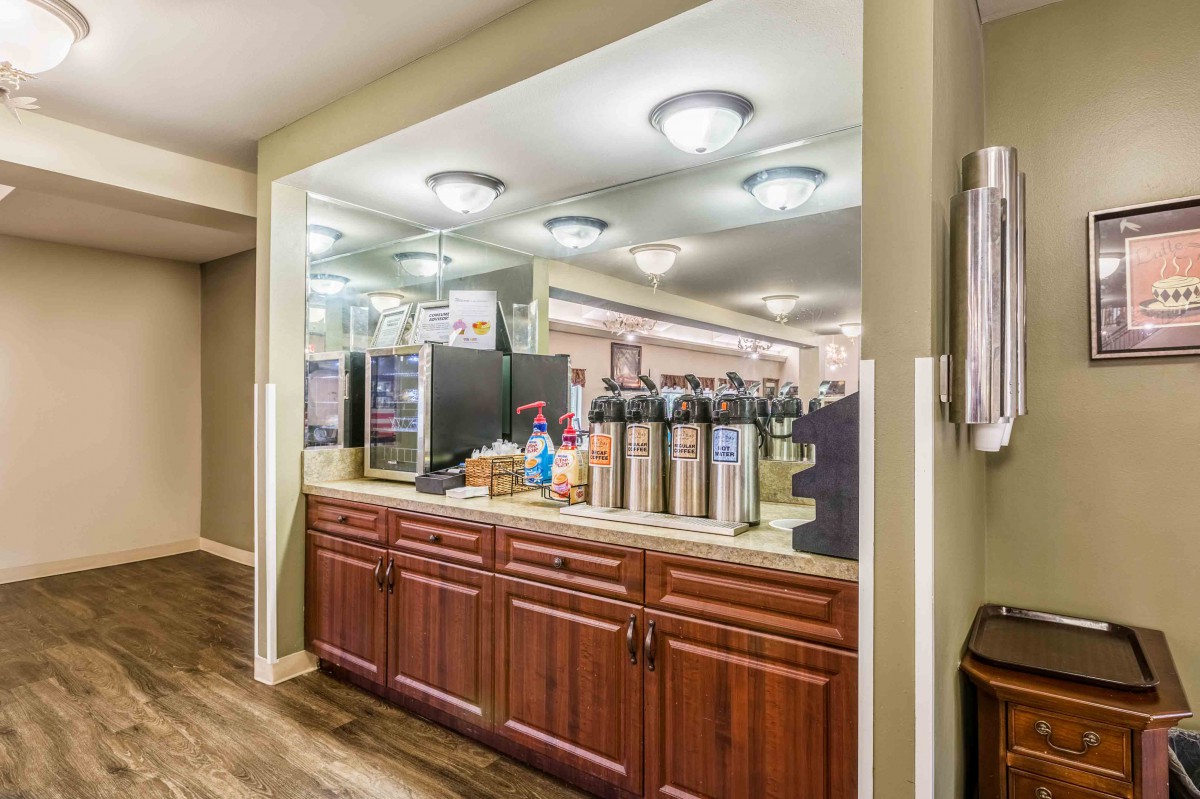 A well-stocked coffee station in a hospitality setting.